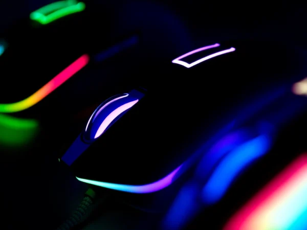 High-performance gaming mice with RGB lighting, adjustable DPI, and ergonomic grip in a gaming setup for precision control